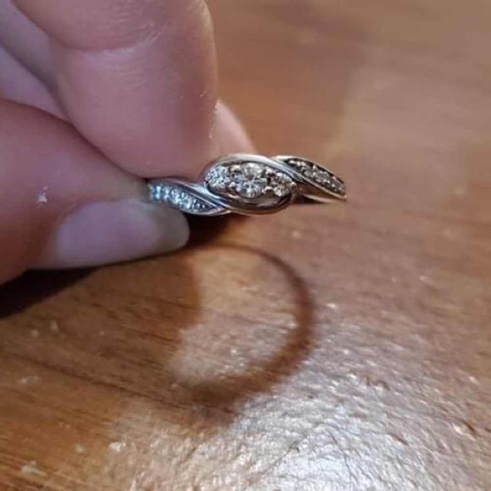 Size 4 diamond ring.